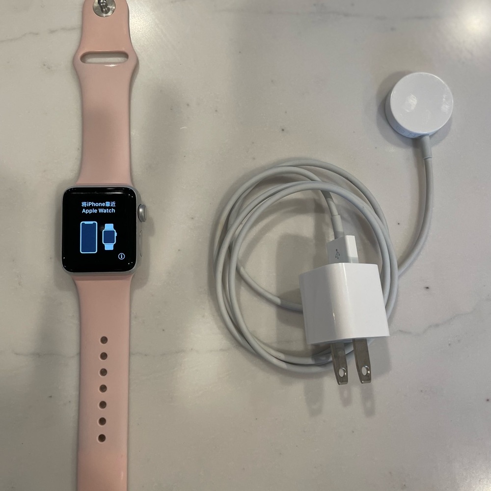Apple Watch series 2 with pink sport band - 38mm